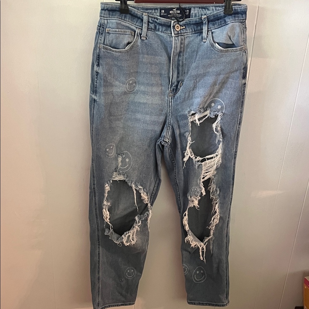 Hollister Relaxed Fit Distressed Blue Jeans with Smiley Faces